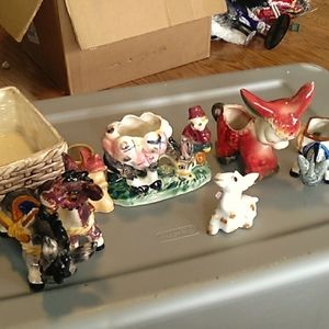 6 Little Donkeys. The biggest one has 2 little donkeys pulling a large cart